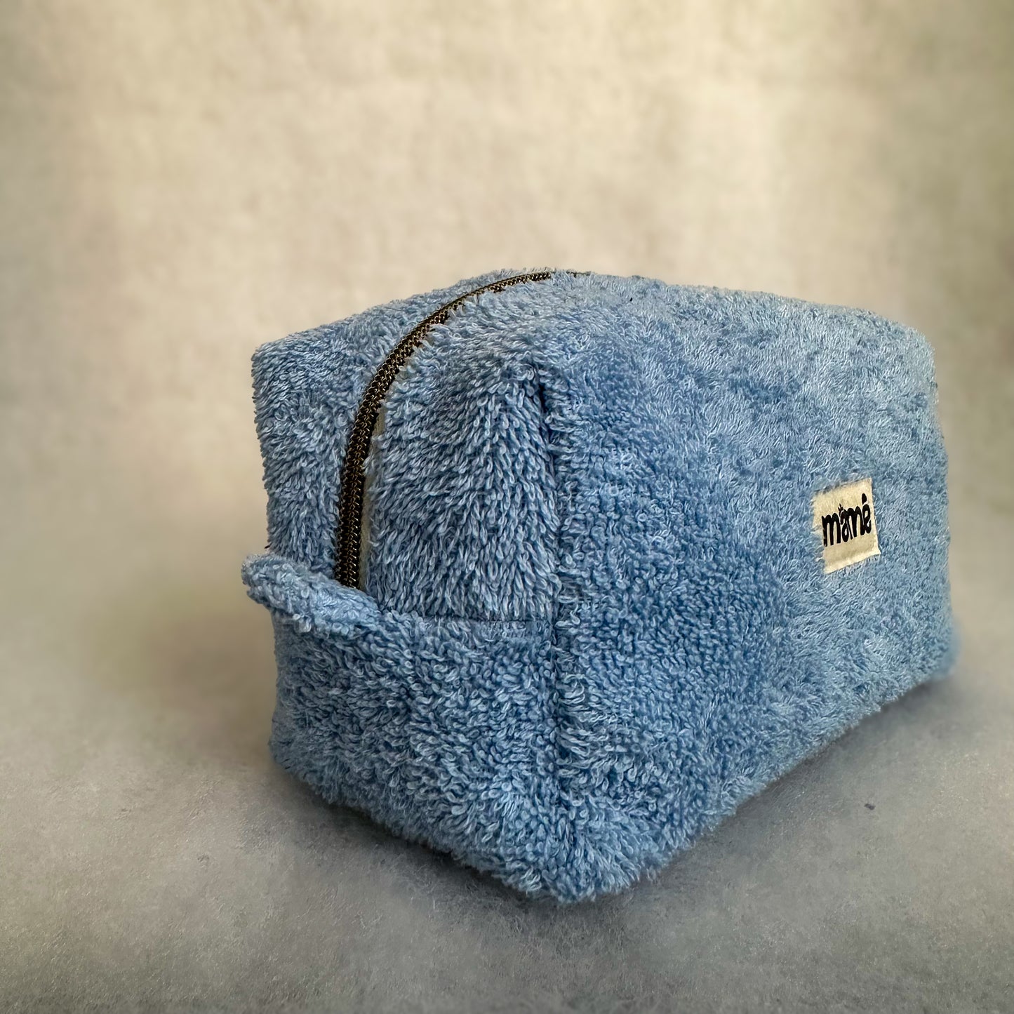 La trousse en éponge BLEU CLAIR