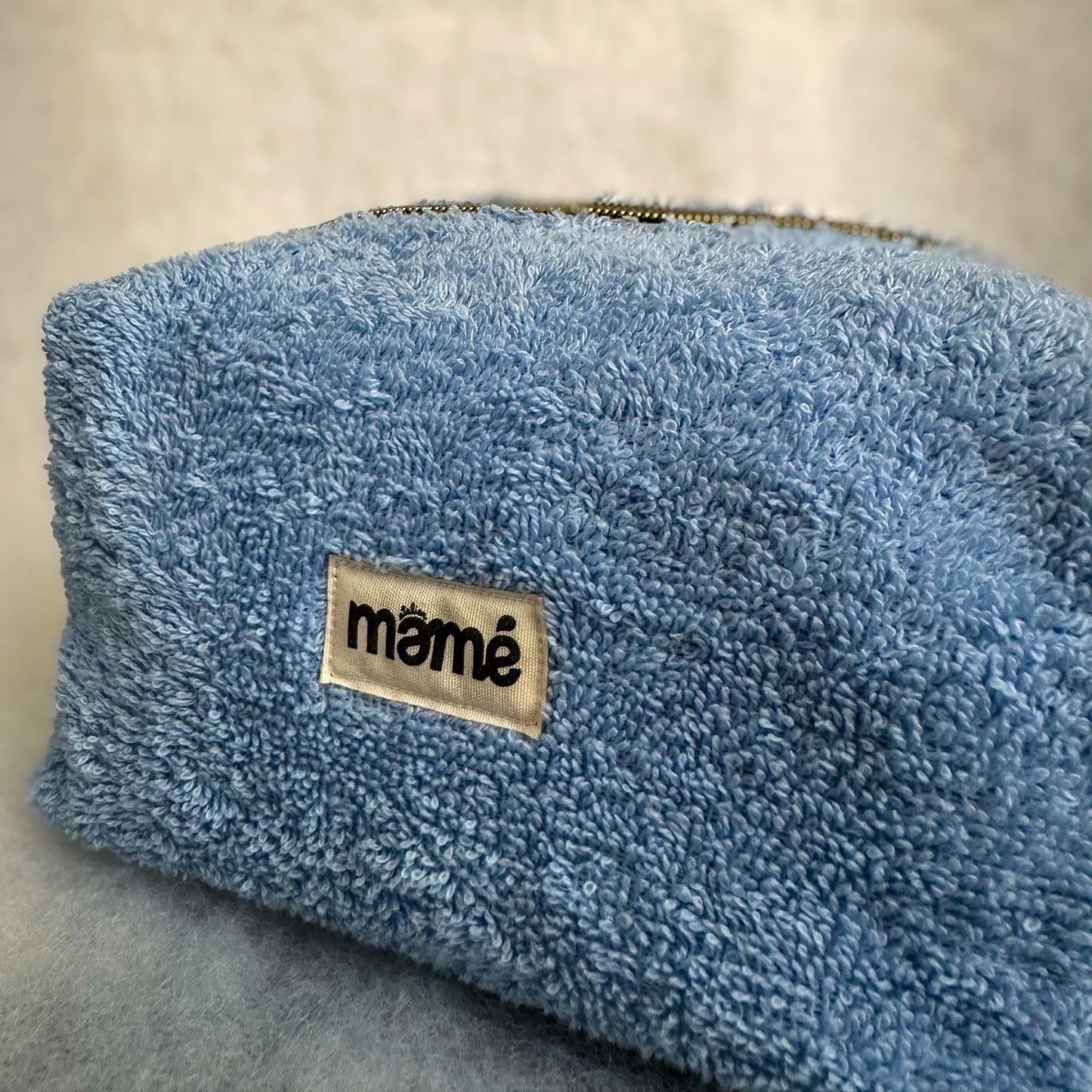 La trousse en éponge BLEU CLAIR