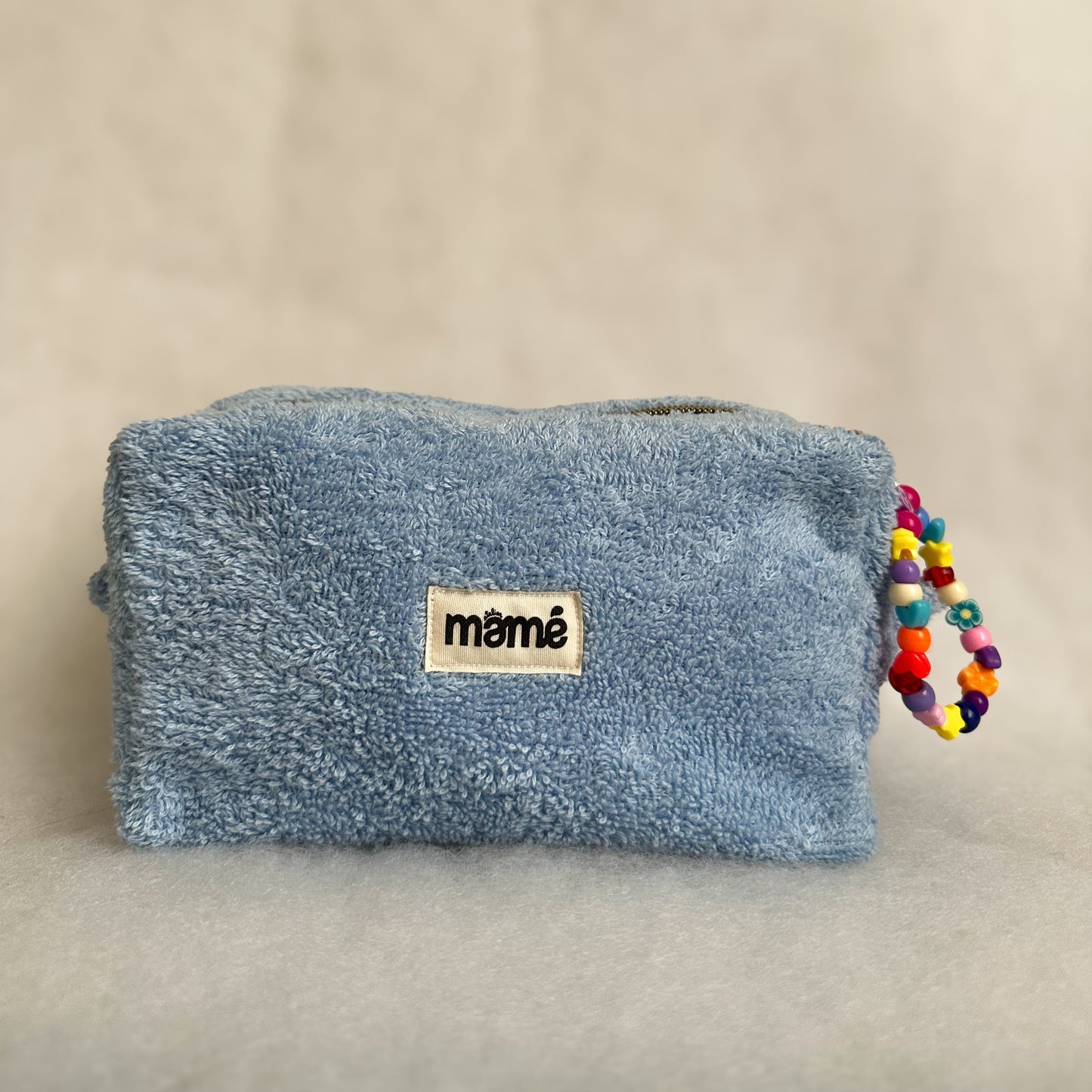 La trousse en éponge BLEU CLAIR
