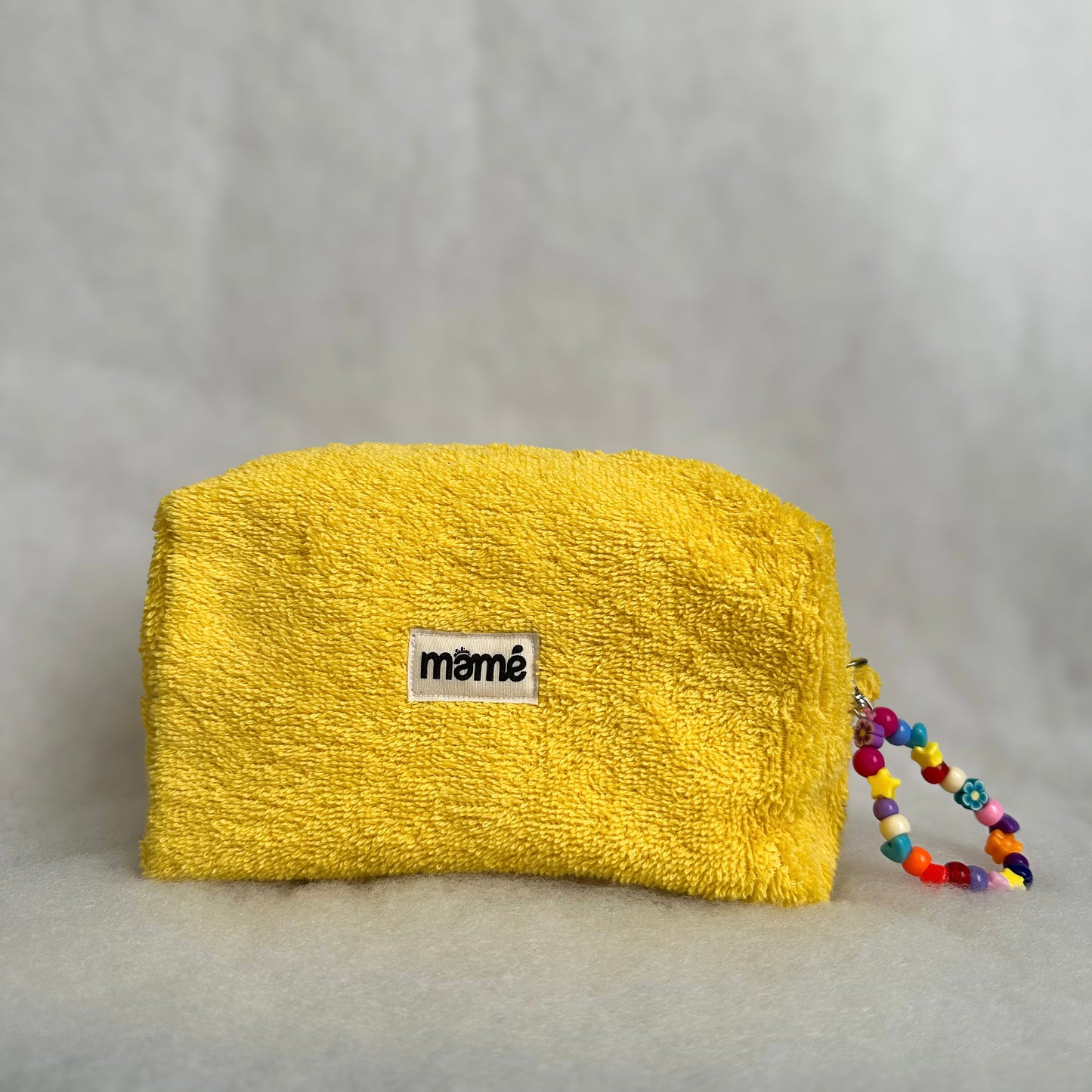 La trousse en éponge JAUNE