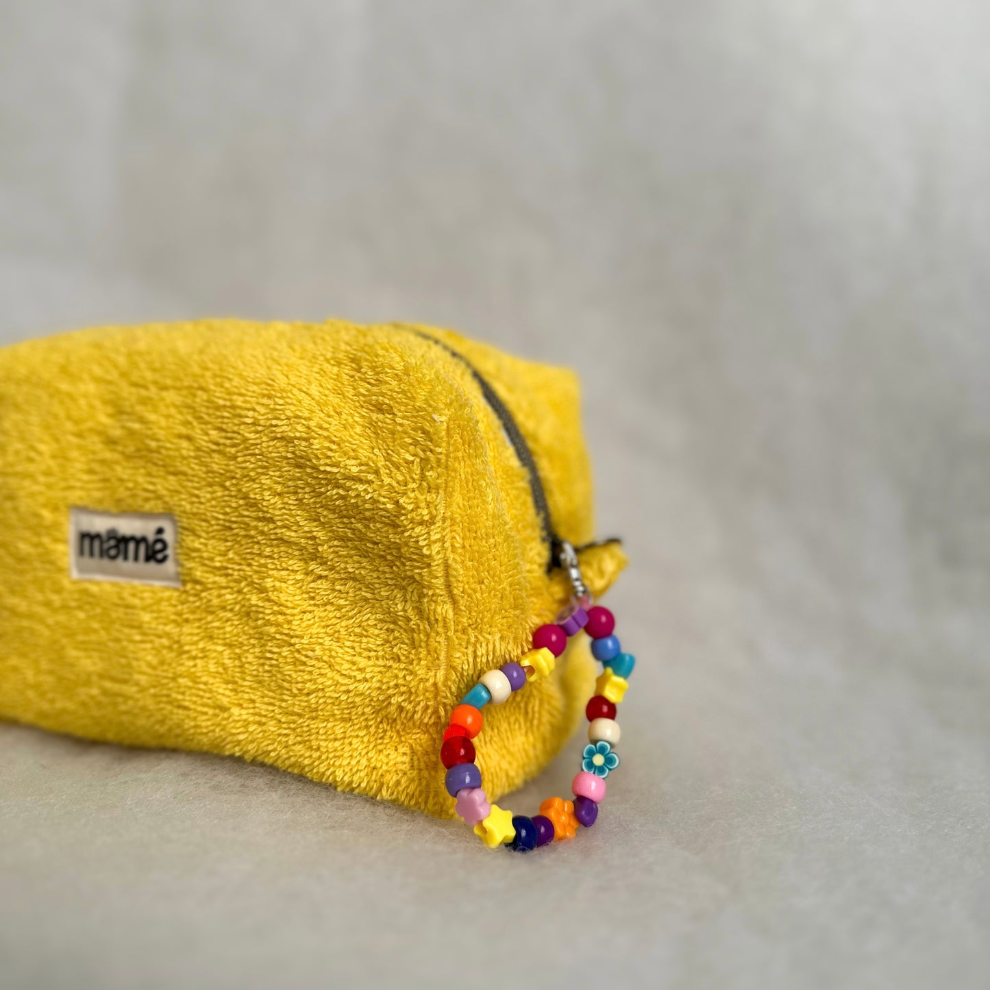 La trousse en éponge JAUNE